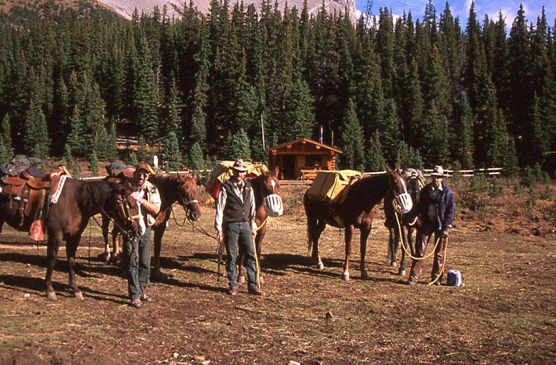 Warden Ivan Phillips, Hal Morrison and Terry Willis in the backcountry of Banff National Park around 1990.