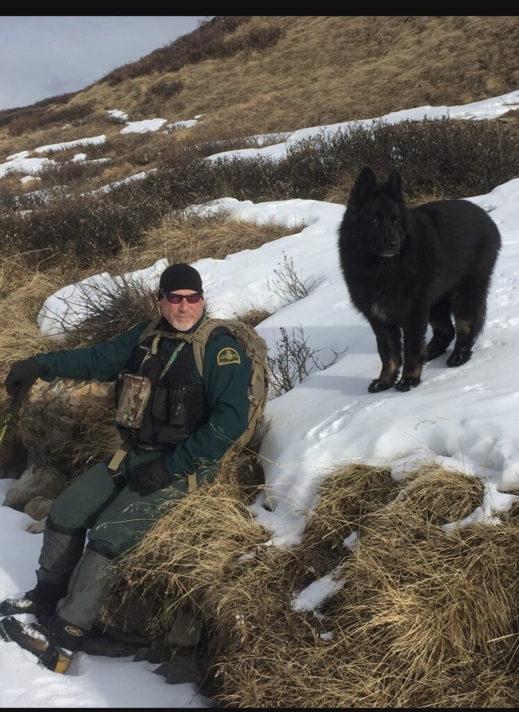 Boundary patrol with Mike Henderson and police dog Cazz around 2017.