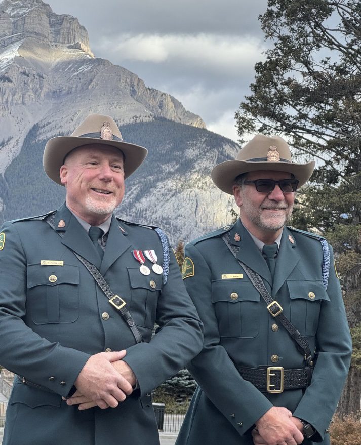 Mike Henderson, left, and Terry Willis in ceremonial tunics during the LEB Exemplary Service Awards in 2025.