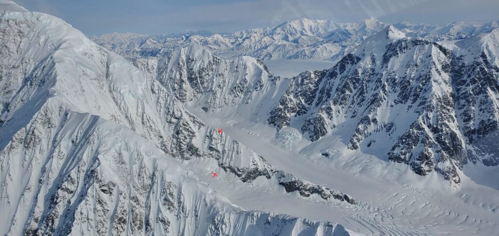 East ridge of Mt. Logan – red xs’ mark points on the ridge and in the cirque below marking the start and finish of their fall.